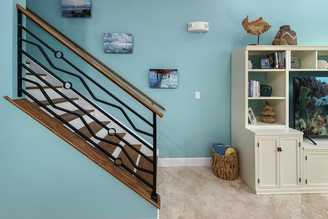 staircase with baseboards