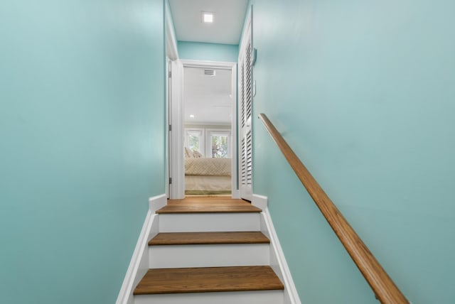 staircase with baseboards