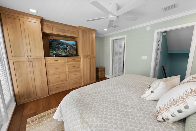 bedroom featuring a ceiling fan, visible vents, ornamental molding, and dark wood-style flooring