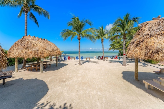 water view featuring a gazebo and a view of the beach