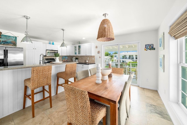 dining room featuring sink