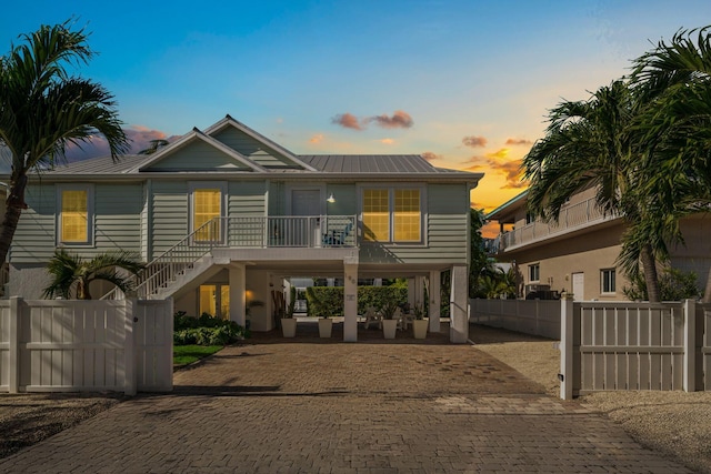 view of front of property with a carport