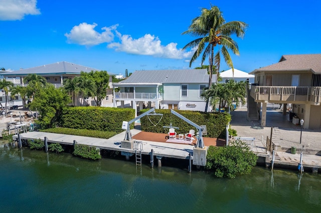 view of dock with a water view