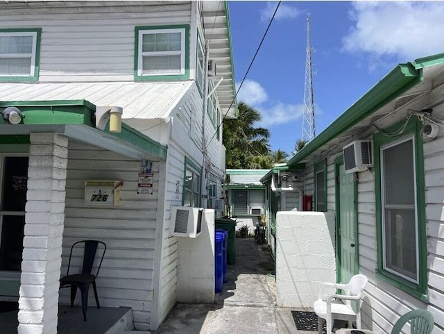720-726 Emma St, Key West, FL 33040 - view of property exterior with an AC wall unit