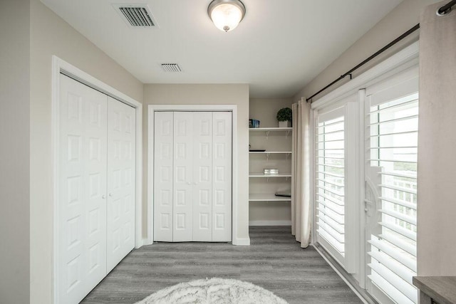 unfurnished bedroom with light hardwood / wood-style flooring