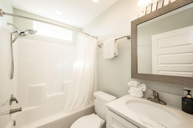 full bathroom featuring vanity, toilet, and shower / bath combo