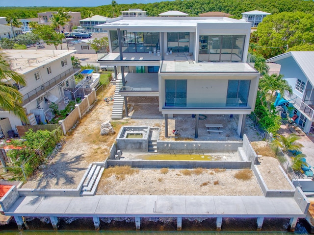16 S Exuma Rd, Key Largo, FL 33037 - back of house featuring a balcony, a patio, and stairs