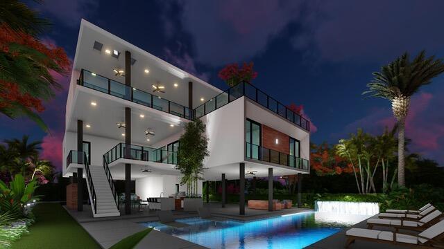 16 S Exuma Rd, Key Largo, FL 33037 - back of house at night with a patio area, a balcony, stairway, and an outdoor pool