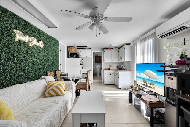 577 Boyd Dr, Key Largo, FL 33037 - living room with a wall mounted AC, ceiling fan, and light tile patterned floors