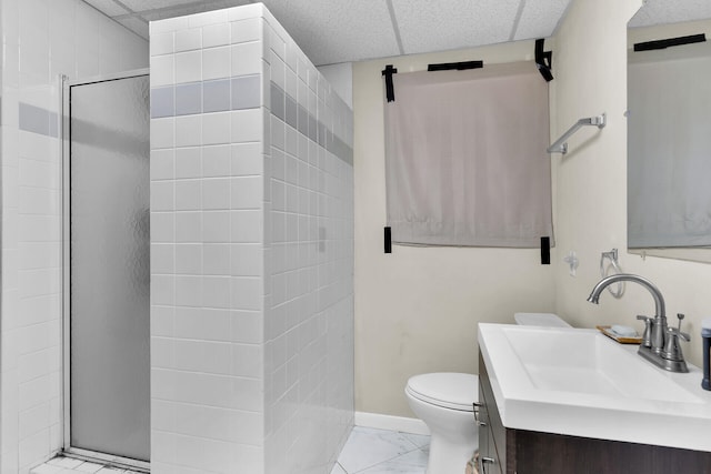577 Boyd Dr, Key Largo, FL 33037 - bathroom featuring toilet, a shower stall, vanity, and marble look tiles