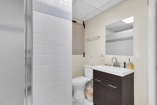 577 Boyd Dr, Key Largo, FL 33037 - bathroom featuring a drop ceiling, vanity, and toilet
