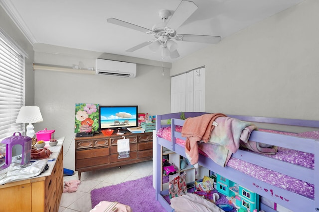 577 Boyd Dr, Key Largo, FL 33037 - bedroom featuring a wall mounted air conditioner, light tile patterned floors, a closet, and ceiling fan