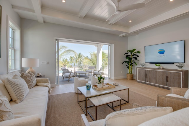 living room featuring coffered ceiling, beam ceiling, light hardwood / wood-style floors, and ceiling fan