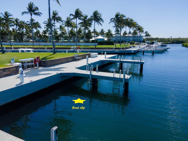 dock area featuring a water view