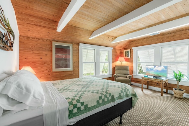 carpeted bedroom featuring vaulted ceiling with beams, wooden ceiling, visible vents, and wooden walls