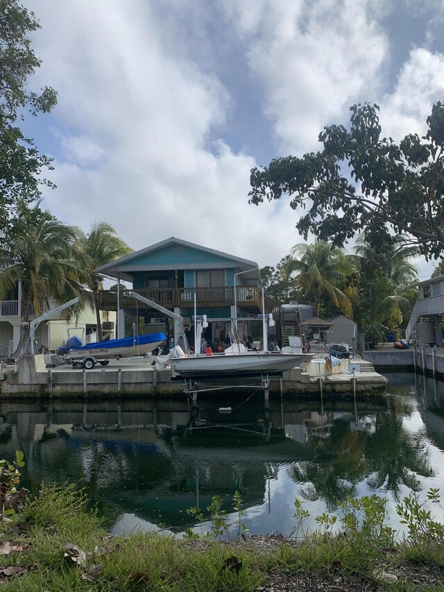 dock area with a water view