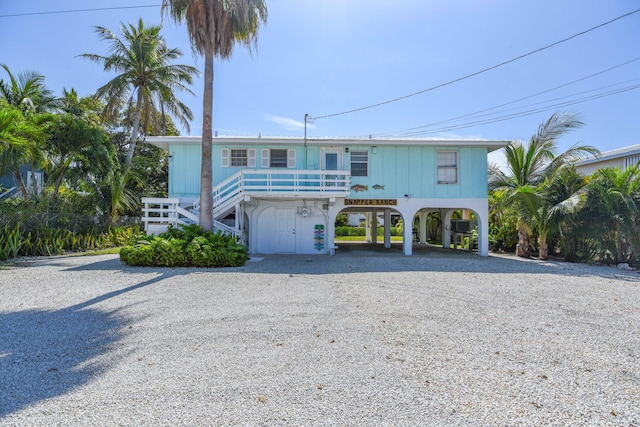 coastal inspired home with a carport