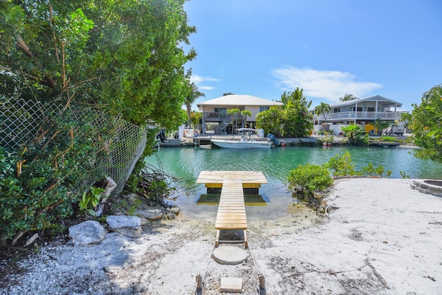 dock area featuring a water view