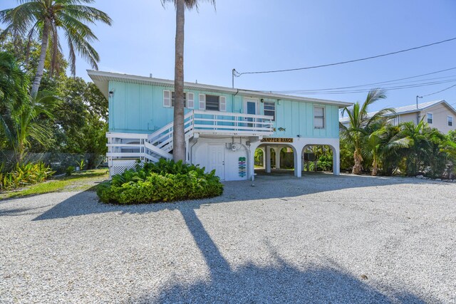 view of front facade with a carport