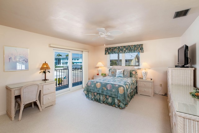 carpeted bedroom featuring access to outside and ceiling fan