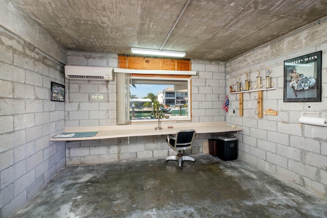 basement featuring a wall unit AC