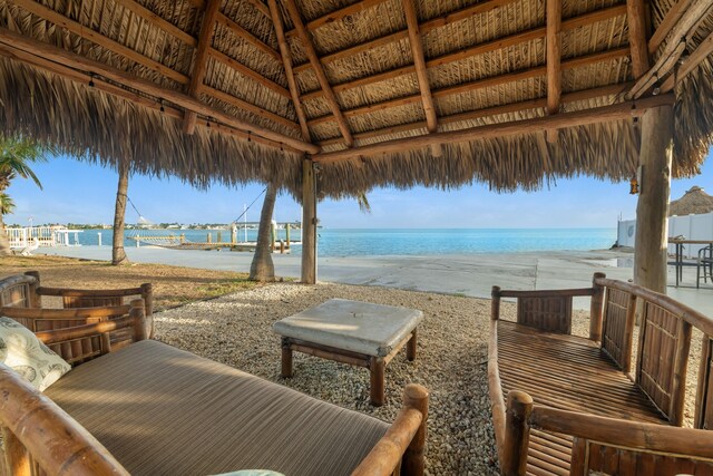 exterior space with a gazebo and a view of the beach