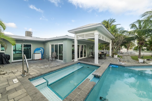 back of property featuring a patio area