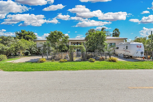 view of front of home with a front yard