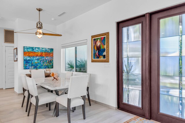 dining room featuring light hardwood / wood-style flooring