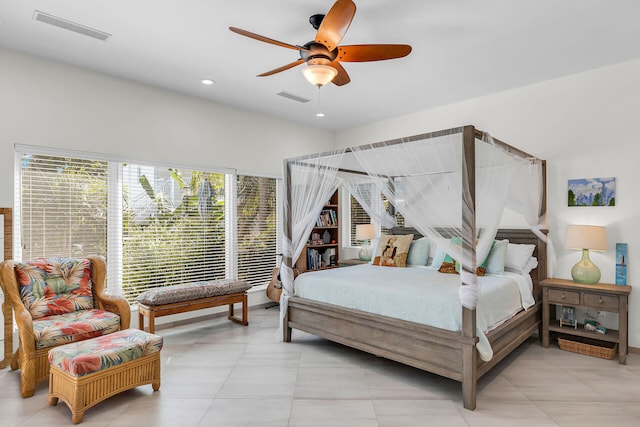 bedroom with light tile patterned floors and ceiling fan