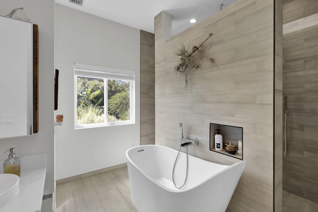 bathroom featuring a tub to relax in