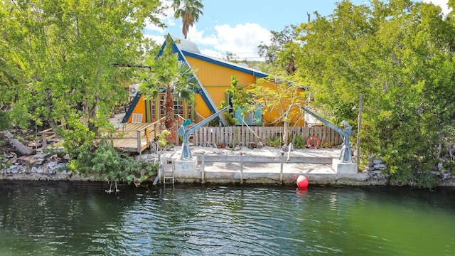 dock area featuring a water view