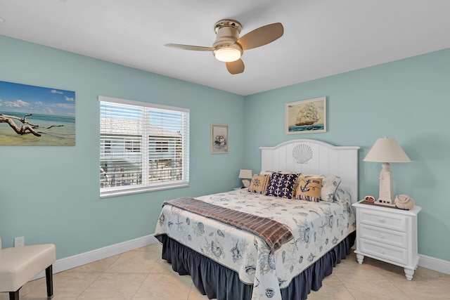 tiled bedroom with ceiling fan