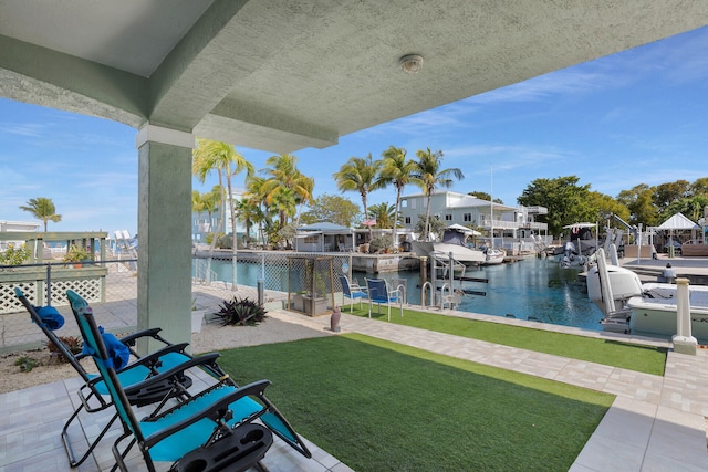 exterior space with a boat dock and a water view