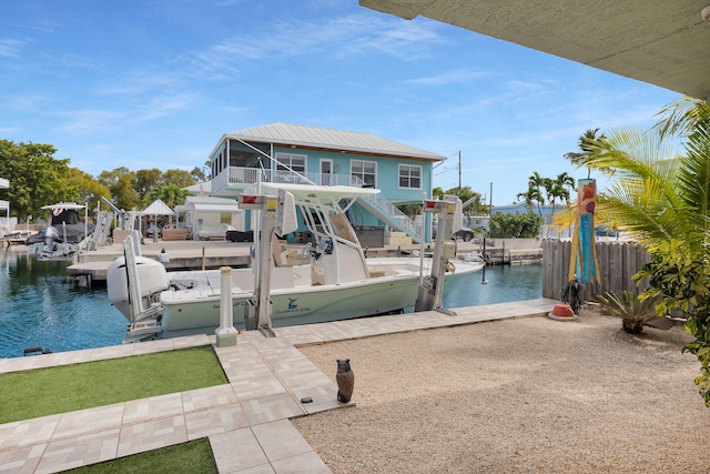 dock area with a water view