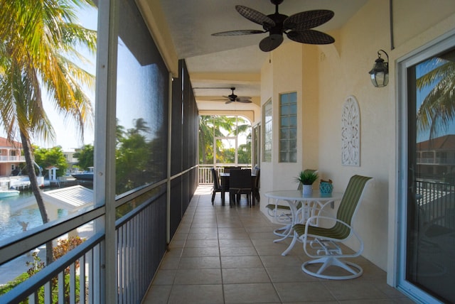 sunroom featuring lofted ceiling