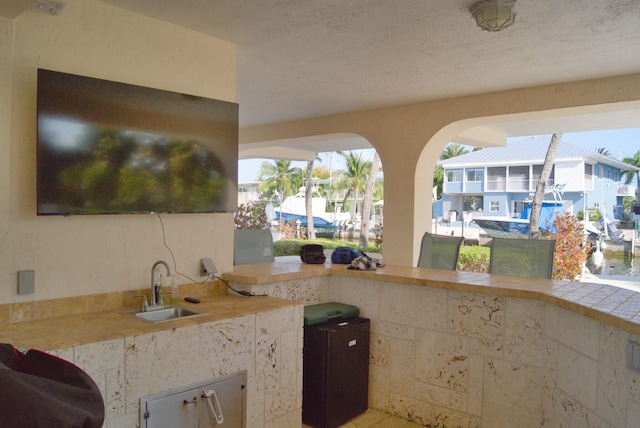 view of patio featuring sink