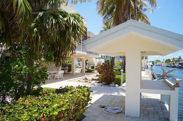 view of patio / terrace featuring a water view