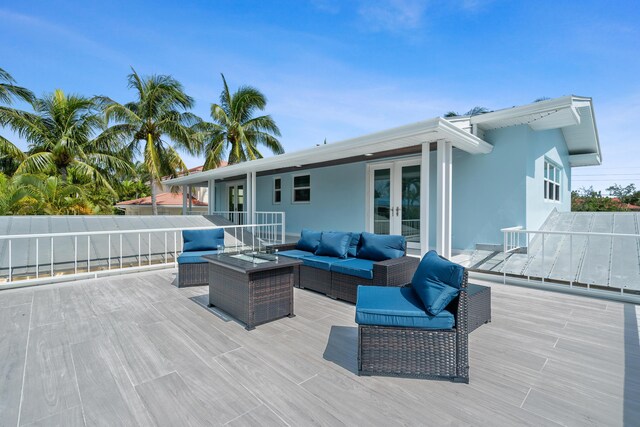 deck with french doors and outdoor lounge area