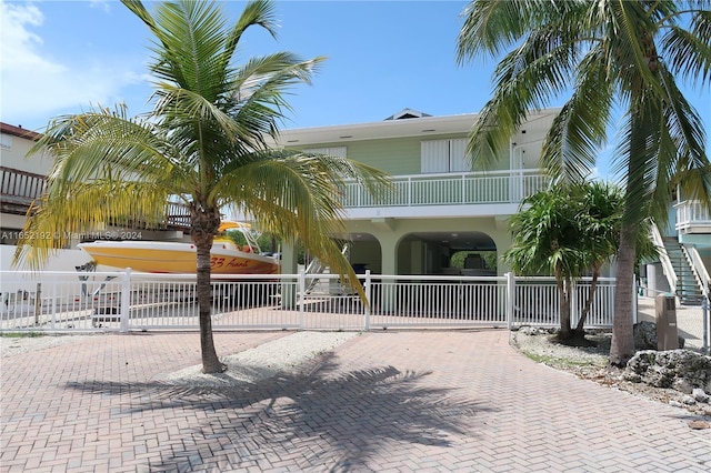 213 Aberdeen Ct, Key Largo, FL 33070 - view of front facade with a balcony