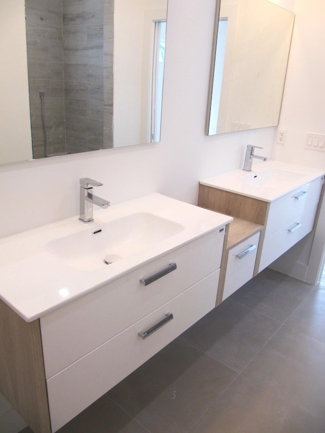 bathroom featuring vanity and tile patterned flooring