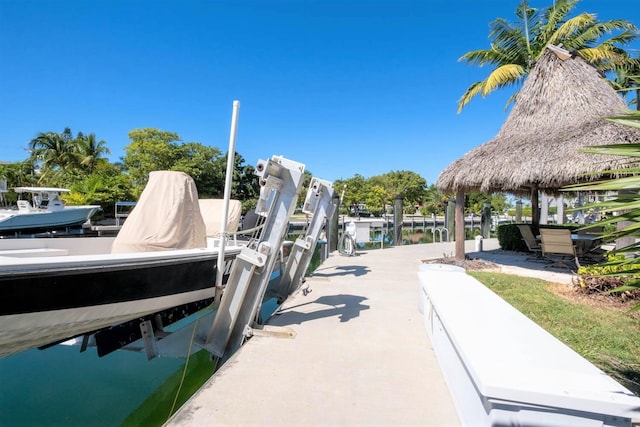 view of dock with a water view