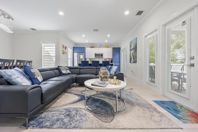 living room with ornamental molding