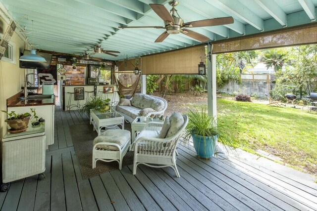 2910 Fogarty Ave, Key West, FL 33040 - wooden terrace with fence, ceiling fan, and a yard