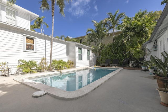 outdoor pool featuring a patio area