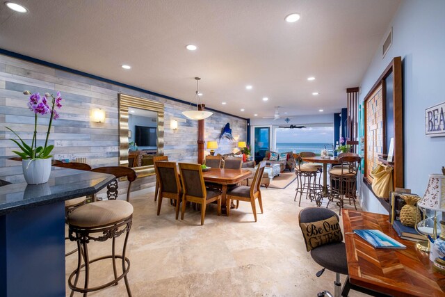 dining space with ceiling fan