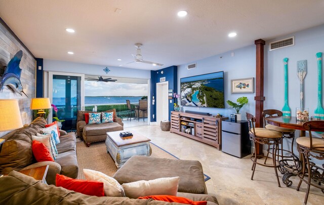 living room with ceiling fan