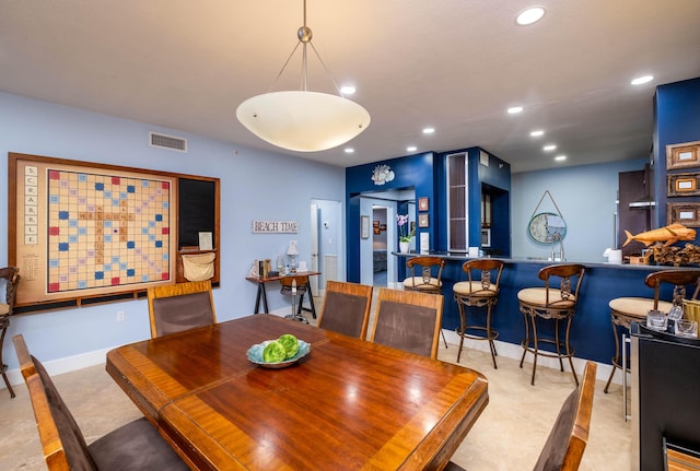 dining space with bar