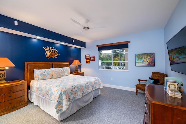 carpeted bedroom featuring ceiling fan