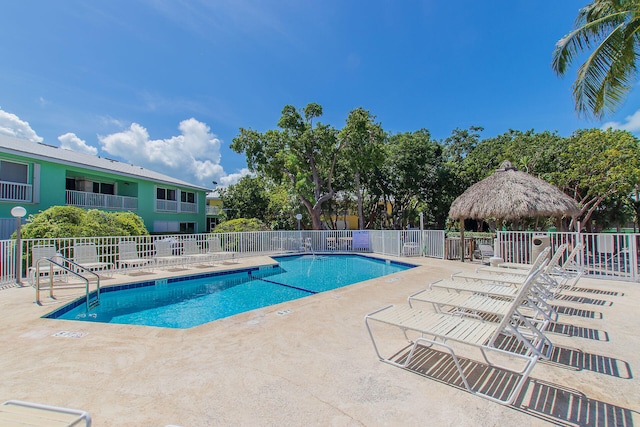 view of swimming pool with a gazebo and a patio